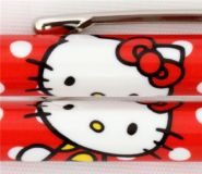 red Hello Kitty ballpoint pen three apples