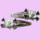 white kitty cat crossbones hairclips