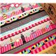 pink robot fabric with many colourful elements 0.5m