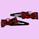 Skull hairclips with roses