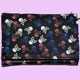 black wallet with many colourful skulls
