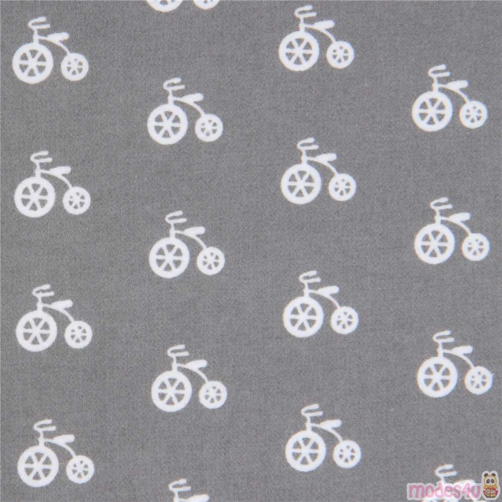 Tela de franela gris con pequeñas bicicletas blancas Cozy Cotton Tela