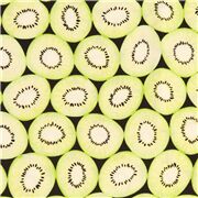 schwarzer Baumwollstoff mit gr&uuml;nen Kiwi Fruchtscheiben