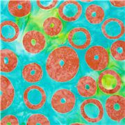 Tissu batik en coton vert beignets anneaux orbites orange style par&eacute;o teint&eacute;