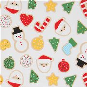 wei&szlig;er Stoff mit bunten Weihnachtspl&auml;tzchen